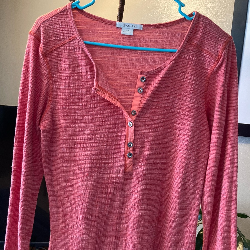 Coral colored long sleeve shirt. Size large, fits like medium